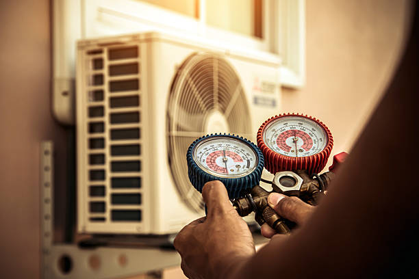 Professional Heat Pump Repair technician working in Brady, TX